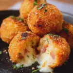 Potato Balls with Chicken Ham, Mozzarella and Herbs
